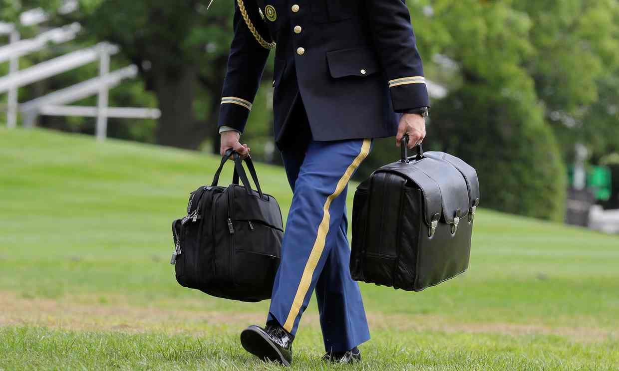 Interception! Trump Just Picked Off The Nuclear Football: The Ominous Black Briefcase That Follows POTUS Everywhere