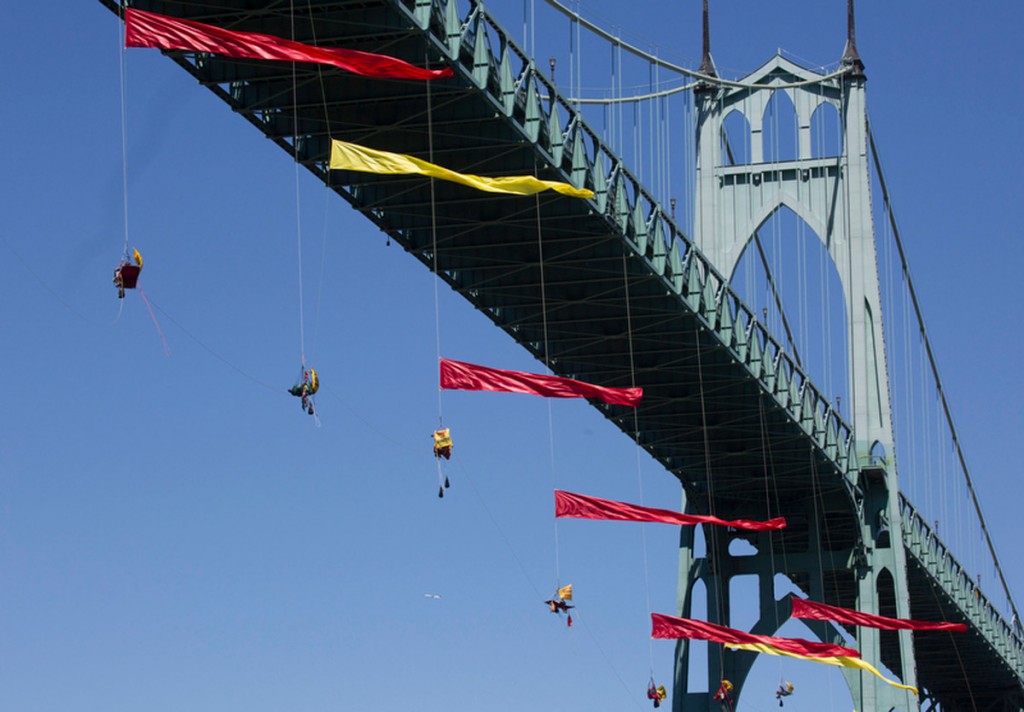 Dangling Kayactivists -- Photo: Greenpeace